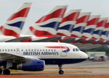 A British Airways aircraft taxis past other parked British Airways aircraft at Terminal 5 of Heathrow Airport in west London, on July 30, 2010.   British Airways said on Friday its net losses widened to 122 million pounds in its first quarter as strike action and the volcanic ash cloud grounded flights but insisted it was set to break even.    BA, which is looking to merge with Spain's Iberia, said losses after tax rose 15 percent to the equivalent of 146 million euros or 191 million dollars in the three months to June compared with a year earlier.      AFP PHOTO/ BEN STANSALL (Photo credit should read BEN STANSALL/AFP/Getty Images)