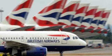 A British Airways aircraft taxis past other parked British Airways aircraft at Terminal 5 of Heathrow Airport in west London, on July 30, 2010.   British Airways said on Friday its net losses widened to 122 million pounds in its first quarter as strike action and the volcanic ash cloud grounded flights but insisted it was set to break even.    BA, which is looking to merge with Spain's Iberia, said losses after tax rose 15 percent to the equivalent of 146 million euros or 191 million dollars in the three months to June compared with a year earlier.      AFP PHOTO/ BEN STANSALL (Photo credit should read BEN STANSALL/AFP/Getty Images)